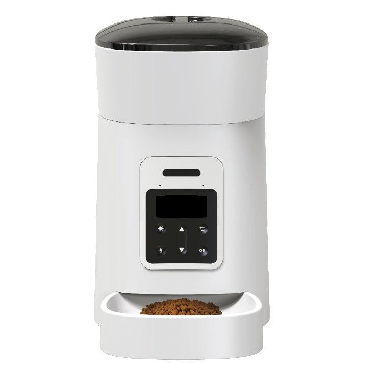 Pet Supplies Automatic Dog Feeder A White automatic pet feeder with a digital control panel and food partially visible at the bottom with white background