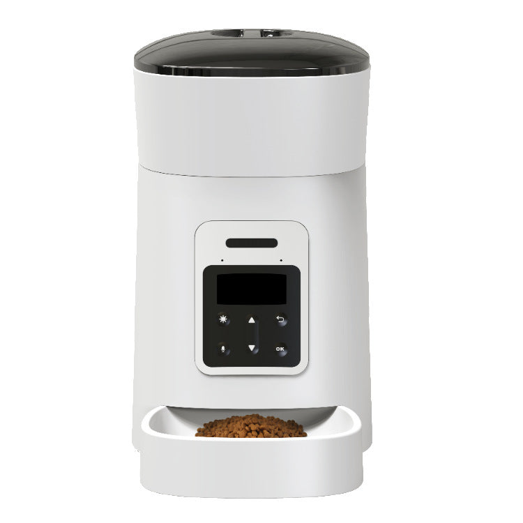 Pet Supplies Automatic Dog Feeder A white automatic pet feeder with a digital control panel and food partially visible at the bottom.
