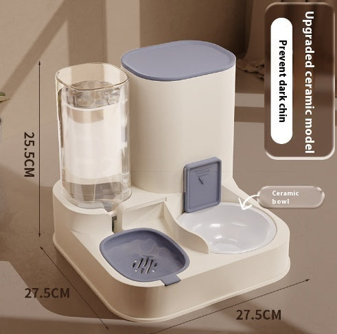 Pet Supplies Automatic Pet Feeder & Water Dispenser An automatic pet feeder with a stainless steel bowl and a clear water reservoir, in a color close to beige, with a cat eating from it with measurement view and of color gray