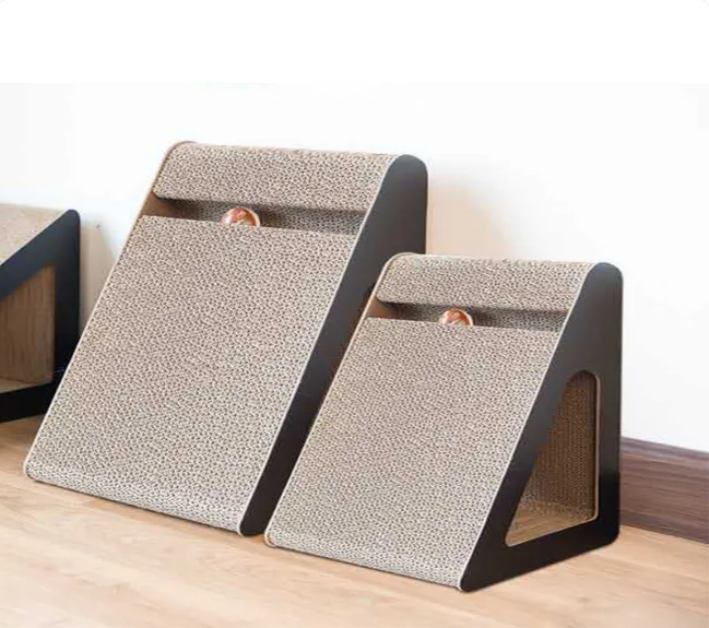 Pet Supplies Happy Pet Triangle Cat Scratch Three triangle cat scratches with a black base and a beige scratching surface, positioned in a home environment.