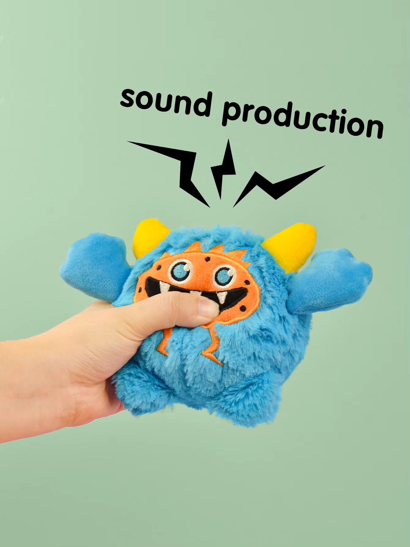Pet Supplies Interactive Squeaky Plush Dog Toy Blue plush toy with yellow ears held by a hand against a light green background with 'sound production' text.