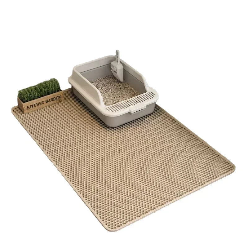 Pet Supplies Non-slip Cat Litter Mat A beige non-slip cat litter mat with a gray litter box and a scoop on top of the mat with white background