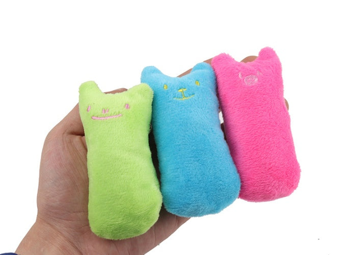 Pet Supplies Pillow Interactive Cat Toy series of colorful plush cat toys in various colors displaying in the hand palm of a person white background view