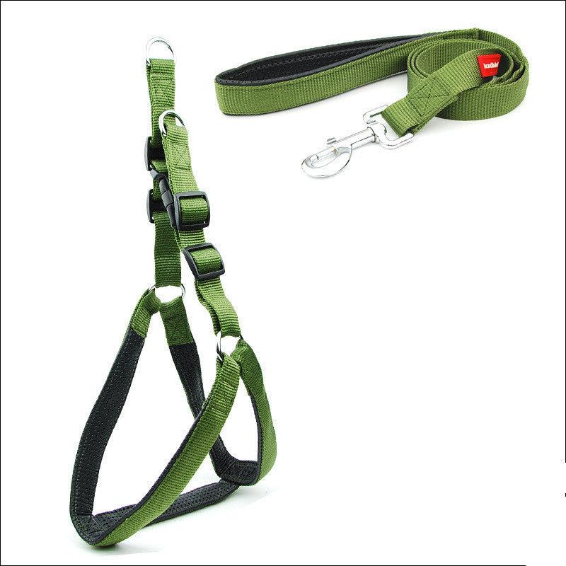A blue dog padded harness with green straps and a metal buckle, designed for walking and training your dog.
