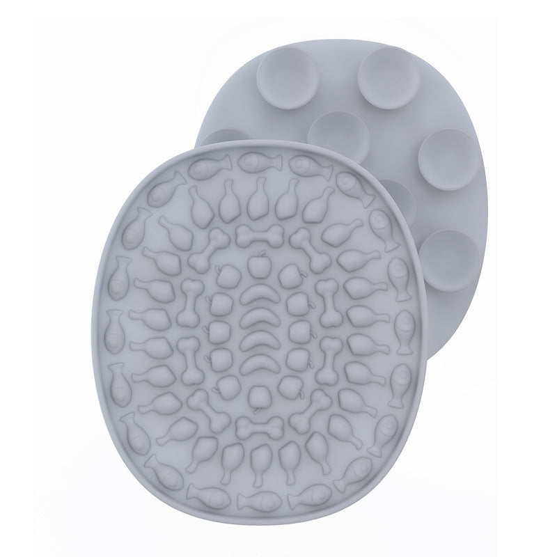 Pet Placemat Silicone Slow Food Mat A silicone pet bowl mat in a beige color with a textured design, resembling a placemat, used to slow down the feeding process.