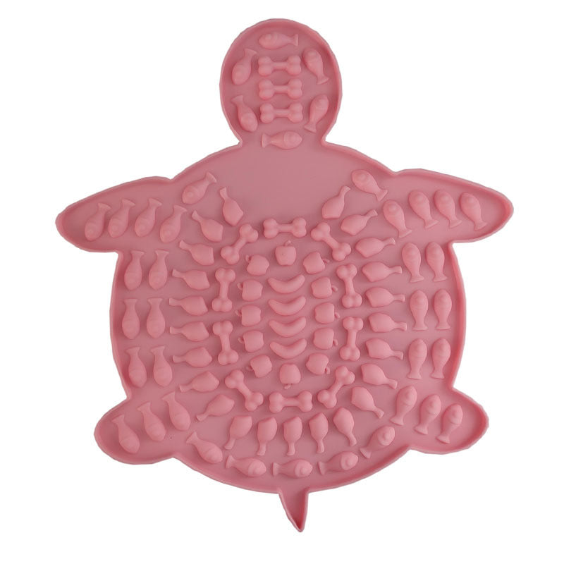 Pet Placemat Silicone Slow Food Mat A silicone pet bowl mat in a dark pink with a textured design, resembling a placemat, used to slow down the feeding process.