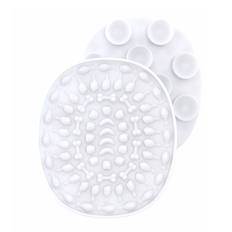 Pet Placemat Silicone Slow Food Mat A silicone pet bowl mat in a white with a textured design, resembling a placemat, used to slow down the feeding process.
