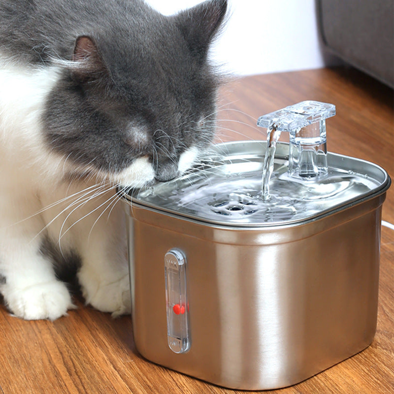 Pet Supplies Automatic Stainless Steel Pet Water & Food Dispenser with image of a cat placing mouth on the steel