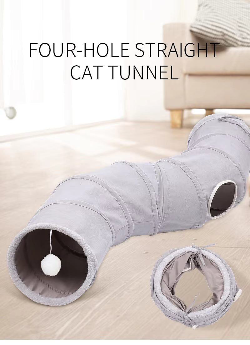 Pet Supplies Eco-Friendly Suede Cat Tunnel Toy Gray four-hole straight cat tunnel on a wooden floor with a couch in the background.