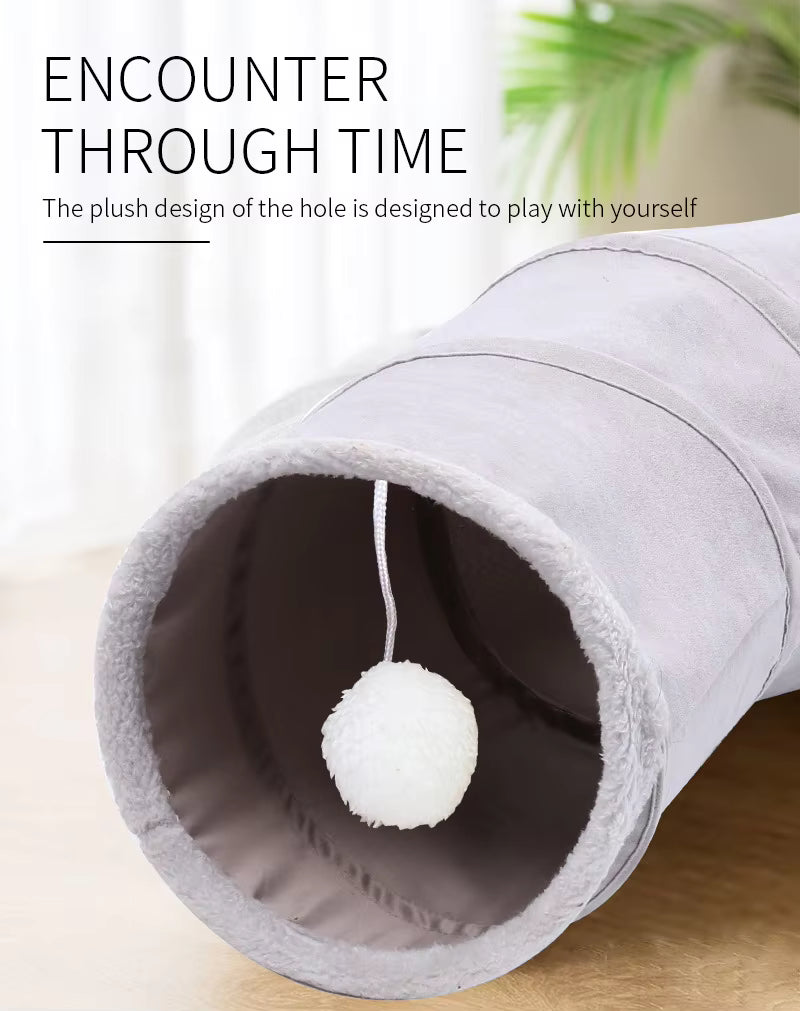 Pet Supplies Eco-Friendly Suede Cat Tunnel Toy Gray plush tunnel with a white ball inside on a light background