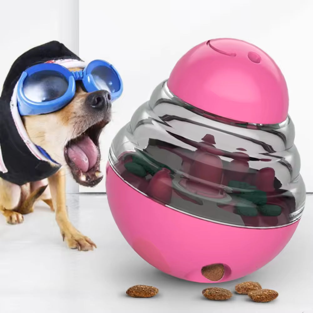 Pet Supplies Interactive Dog & Cat Treat Dispensing Toy Dog wearing goggles with a pink and silver ball toy filled with treats on a white background