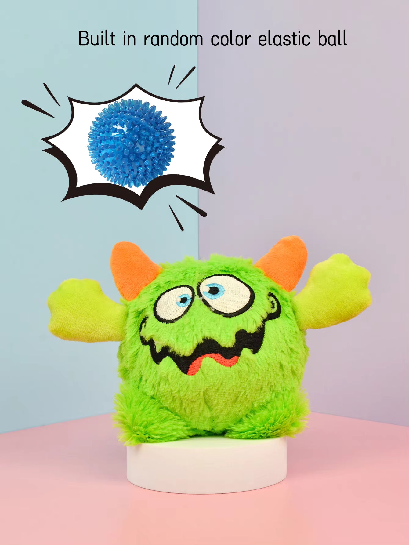 Pet Supplies Interactive Squeaky Plush Dog Toy Green plush toy with orange ears and a blue elastic ball on a pink and blue gradient background.