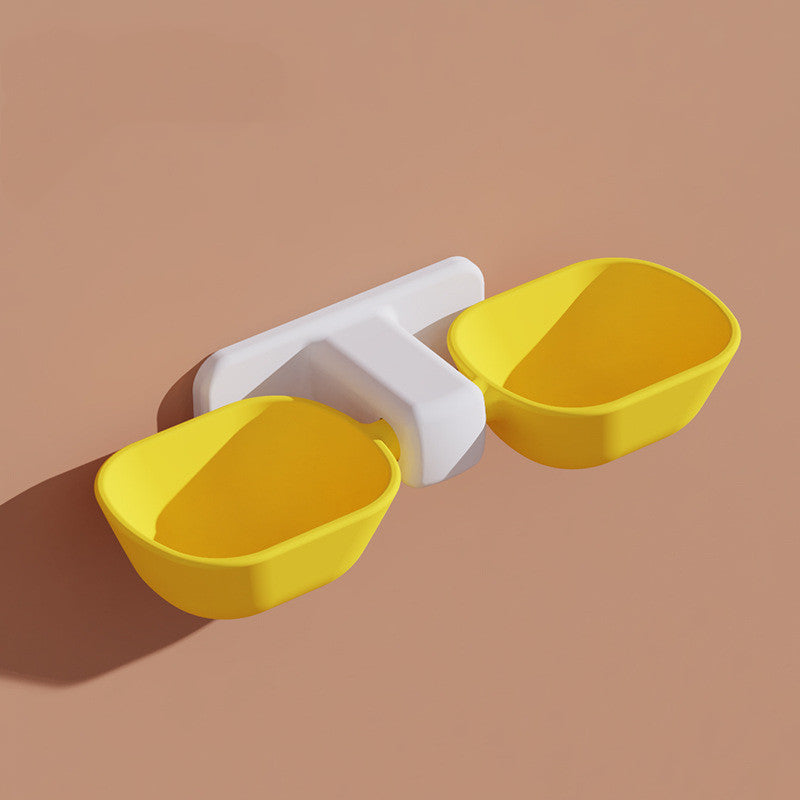 Pet Supplies Pet Double Bowl Feeder A white double yellow pet bowl with adjustable height with horizontal measurement set against a beige background 