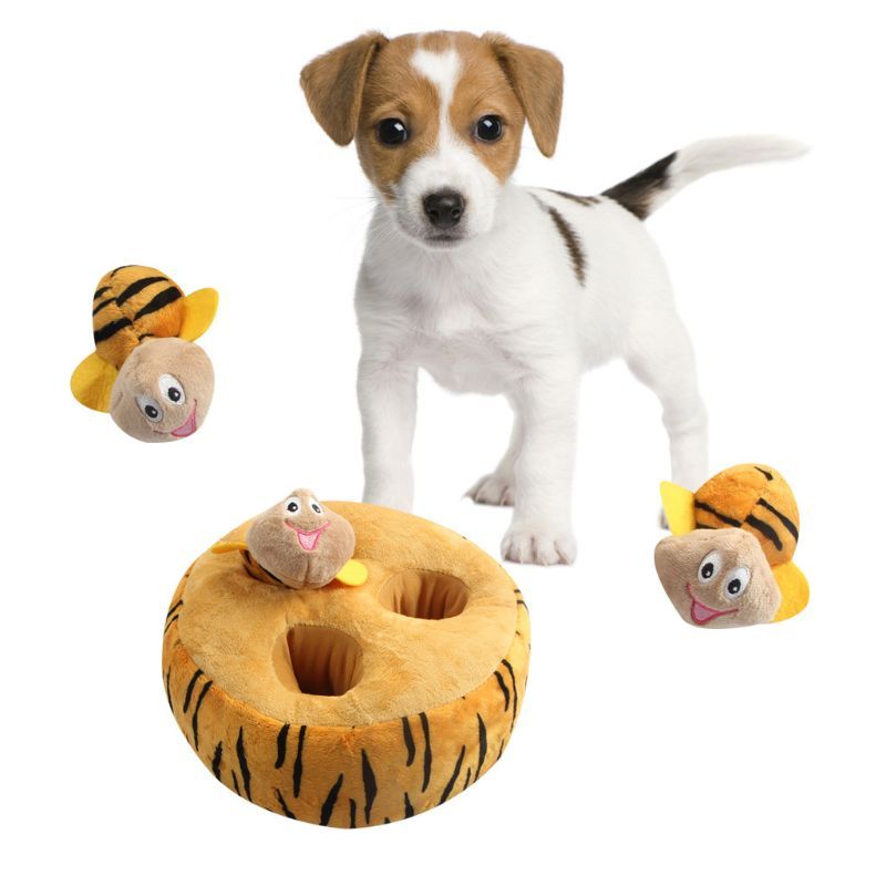Pet Supplies Pet Voice Flush Toy A dog interacting with a stuffed toy designed to resemble a bird, part of a pet voice flush toy series.