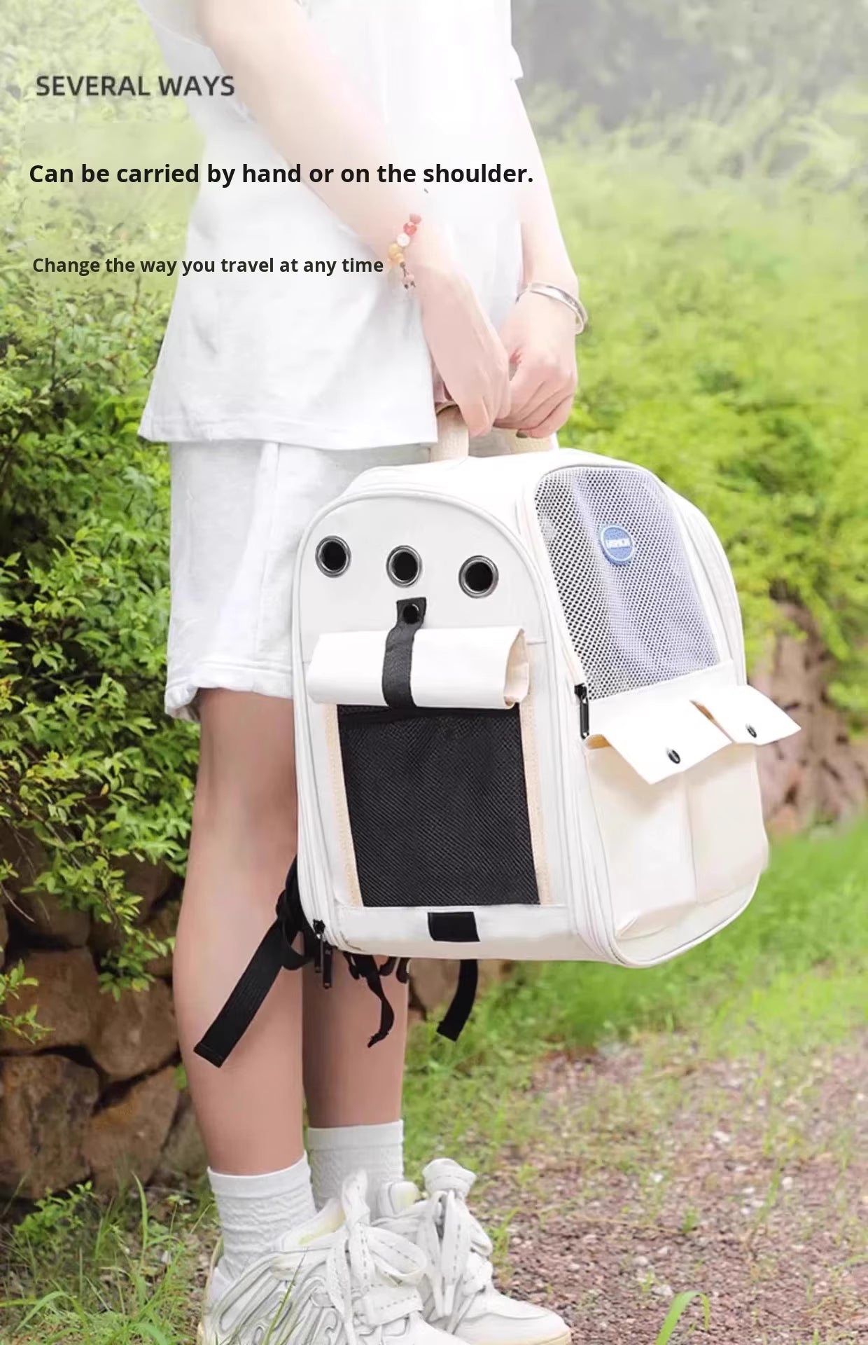Pet Supplies Portable Transparent Pet Carrier Backpack Person holding a white pet carrier with text on several ways to carry it.