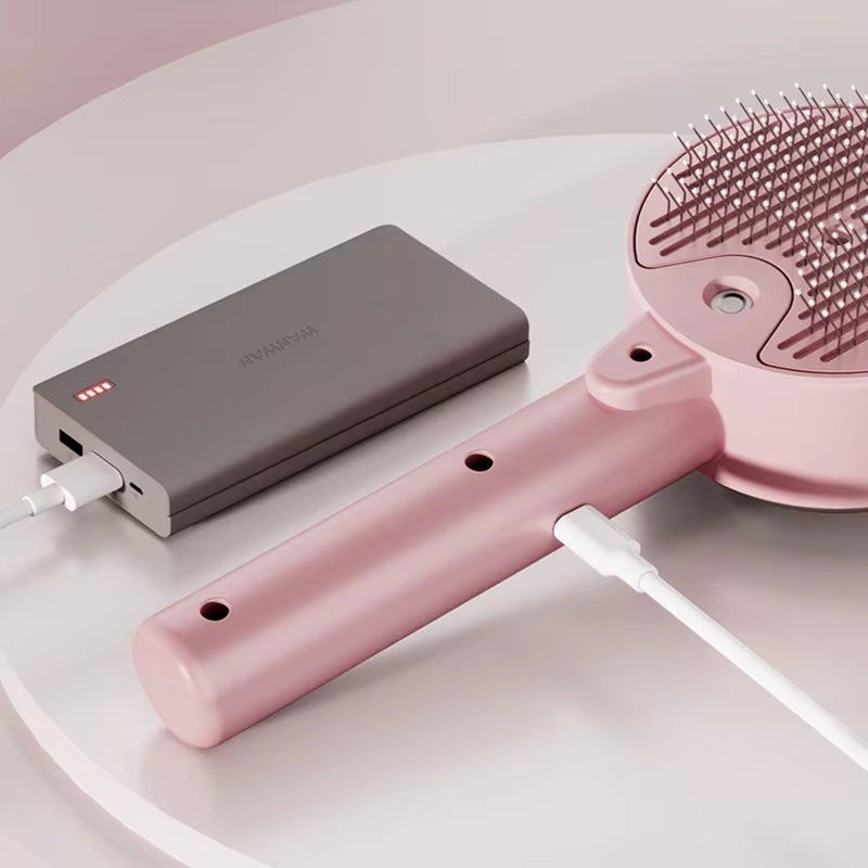 Pet Supplies Steamy Pink Pet Grooming Brush with power bank connected